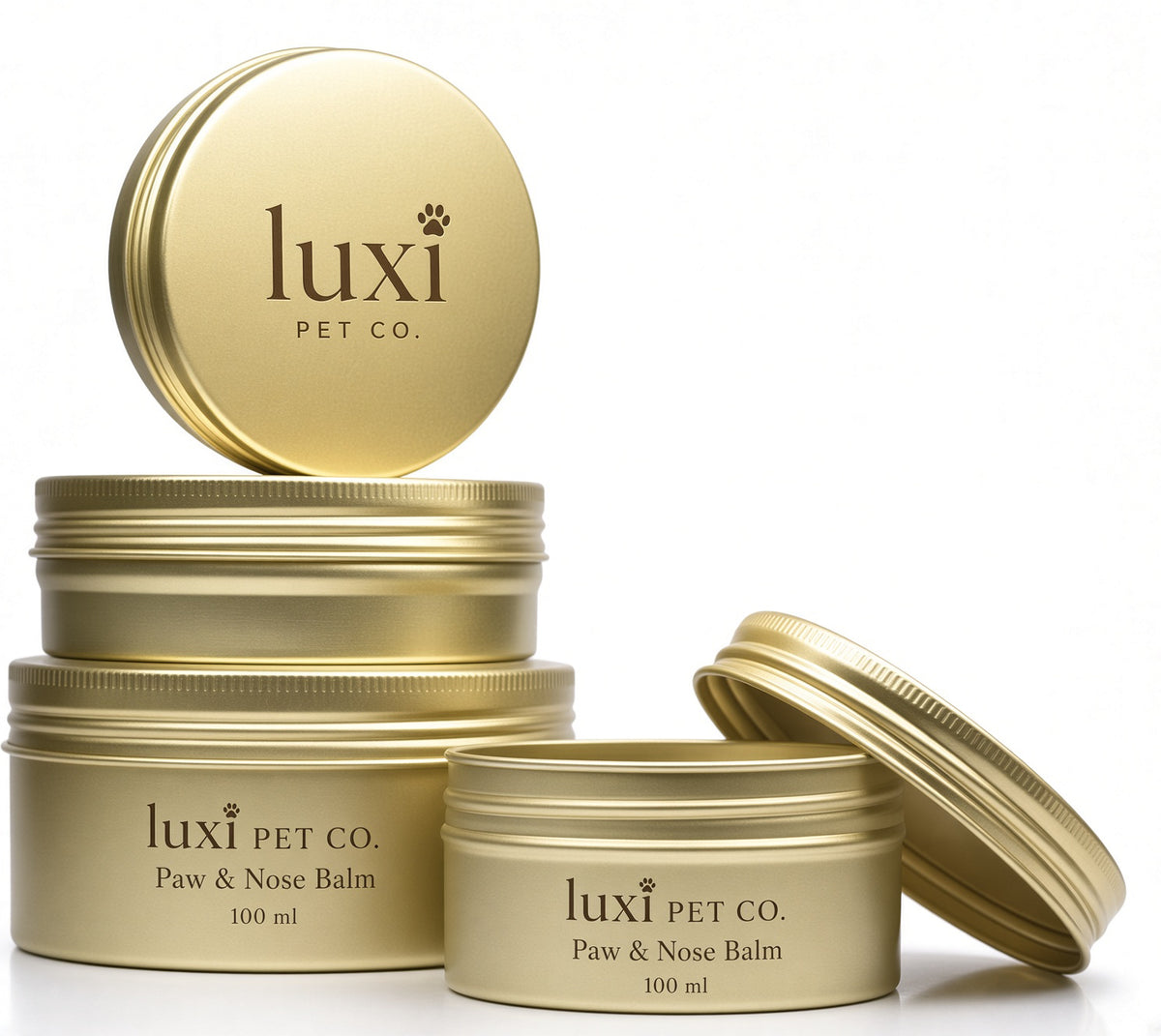 Luxi Paw & Nose Balm in gold 100ml tins, with stacked tins and one open tin
